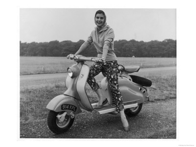 girl-wearing-a-headscarf-and-jazzy-slacks-models-a-lambretta-ld-125-mark-iv-scooter.jpg